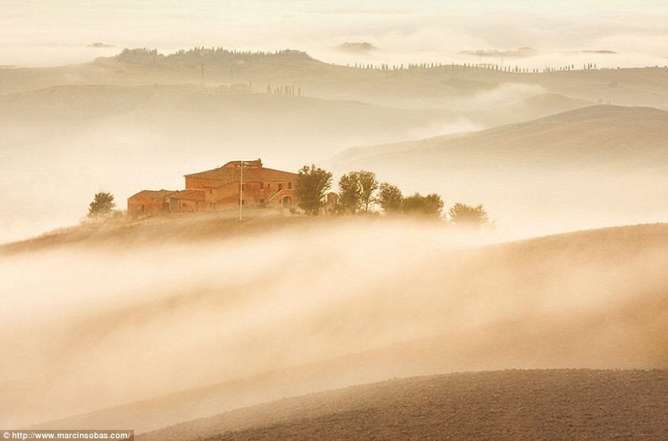 Hills of Tuscany shrouded in mist photos Puglia luxury apartments Essential Italy