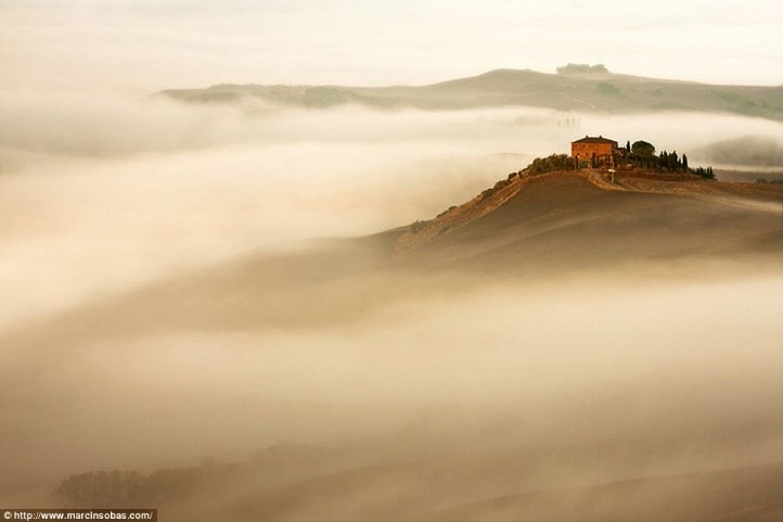 Hills of Tuscany shrouded in mist photos Puglia luxury apartments Essential Italy