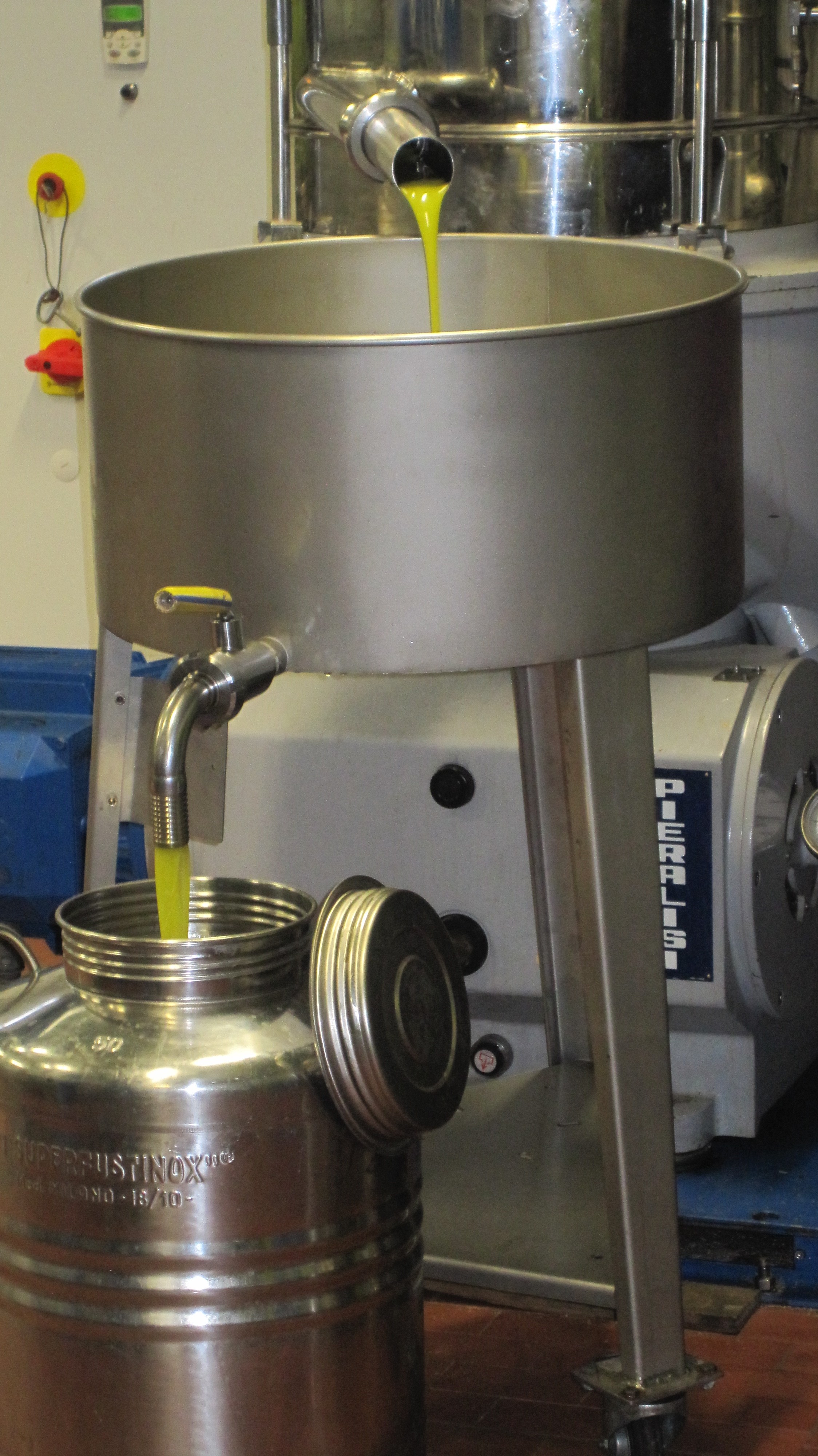 Olives being pressed at a mill near our Tuscany holiday villas