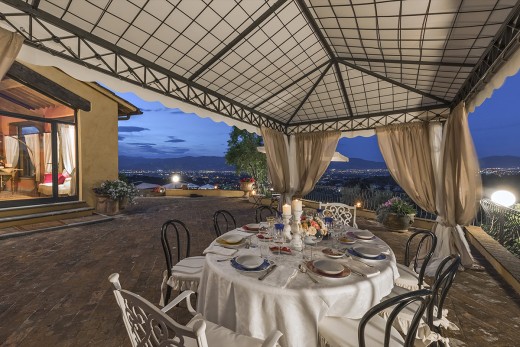 get together for a family meal under the stars in the villas in Italy