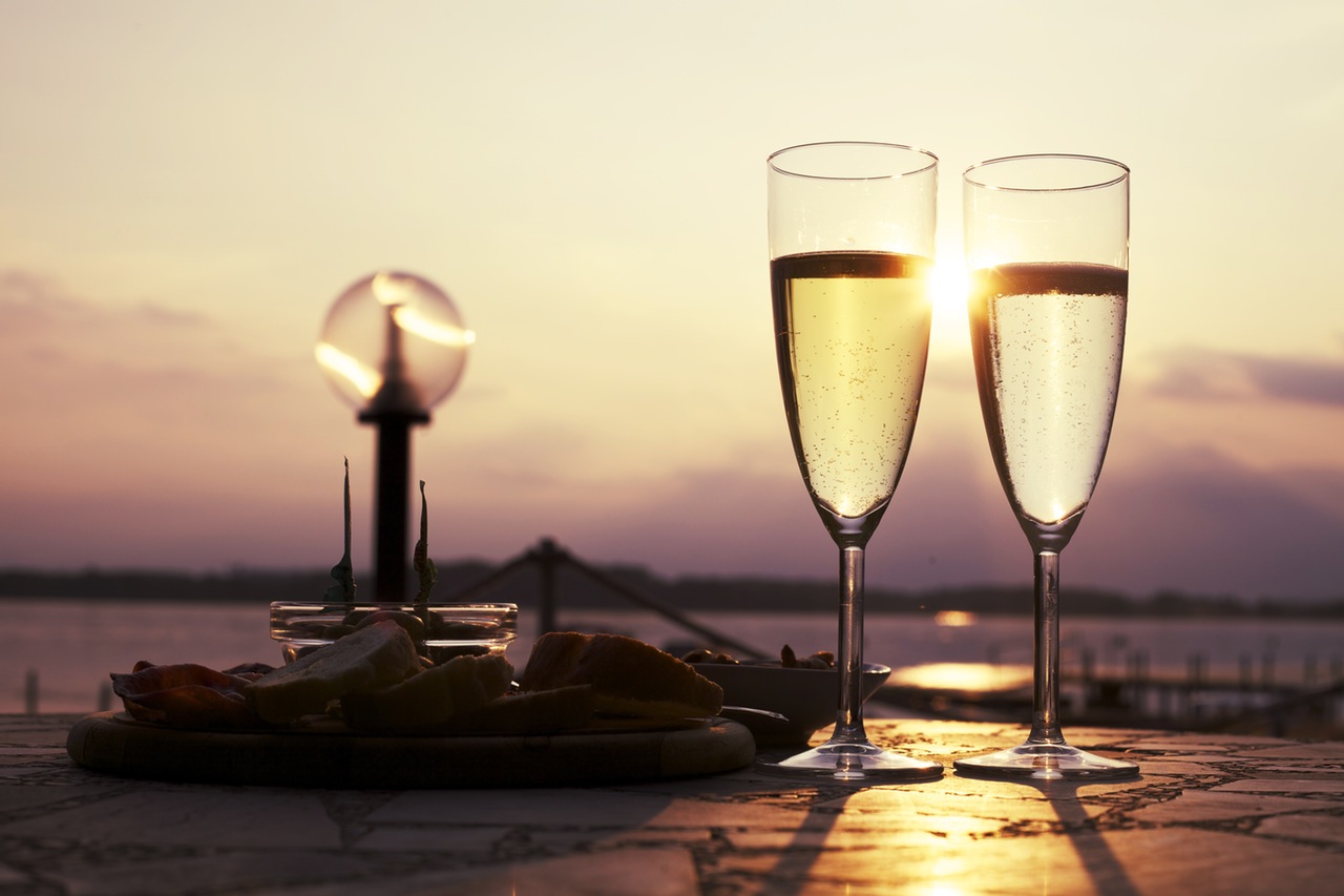 get romantic with champagne for tea by the water at the family friendly villas in Italy. 