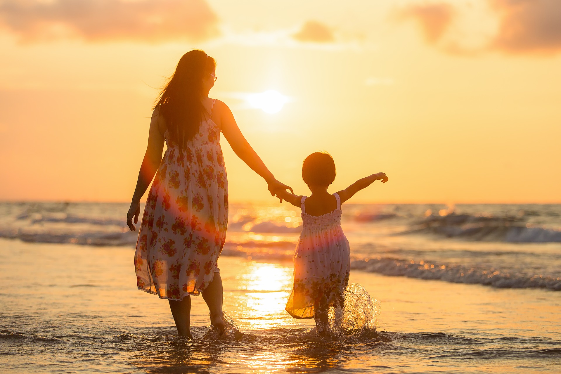 A mother and daughter on the beach