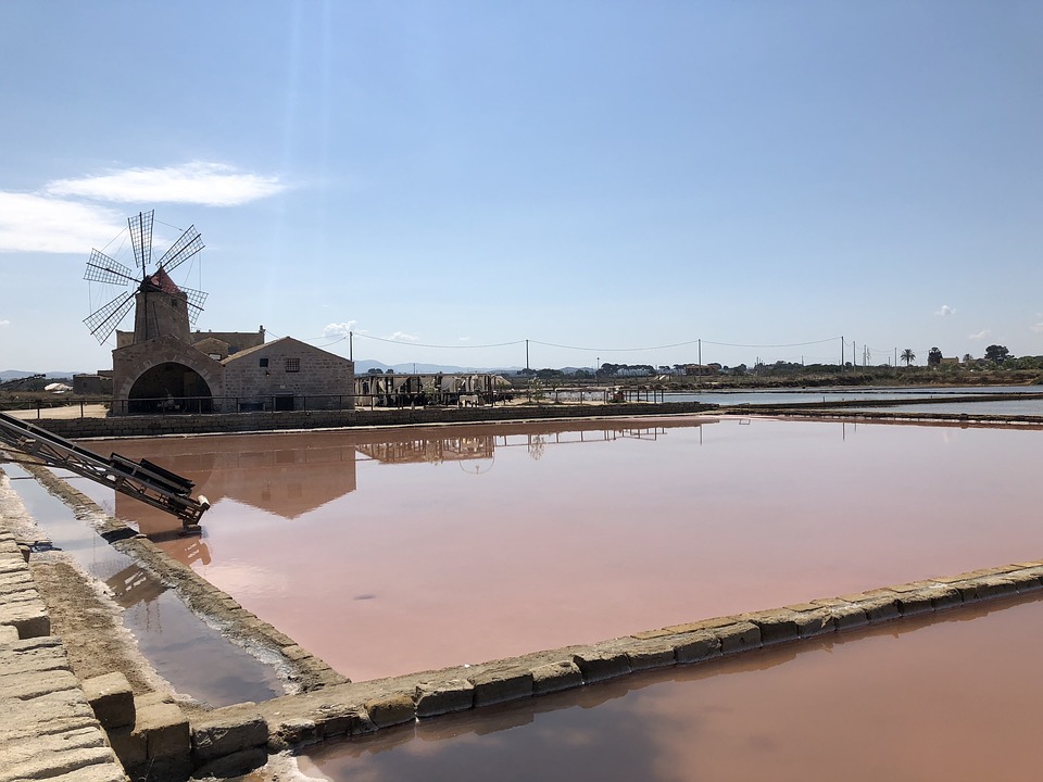 A saline pool and windmill for salt production in Sicily