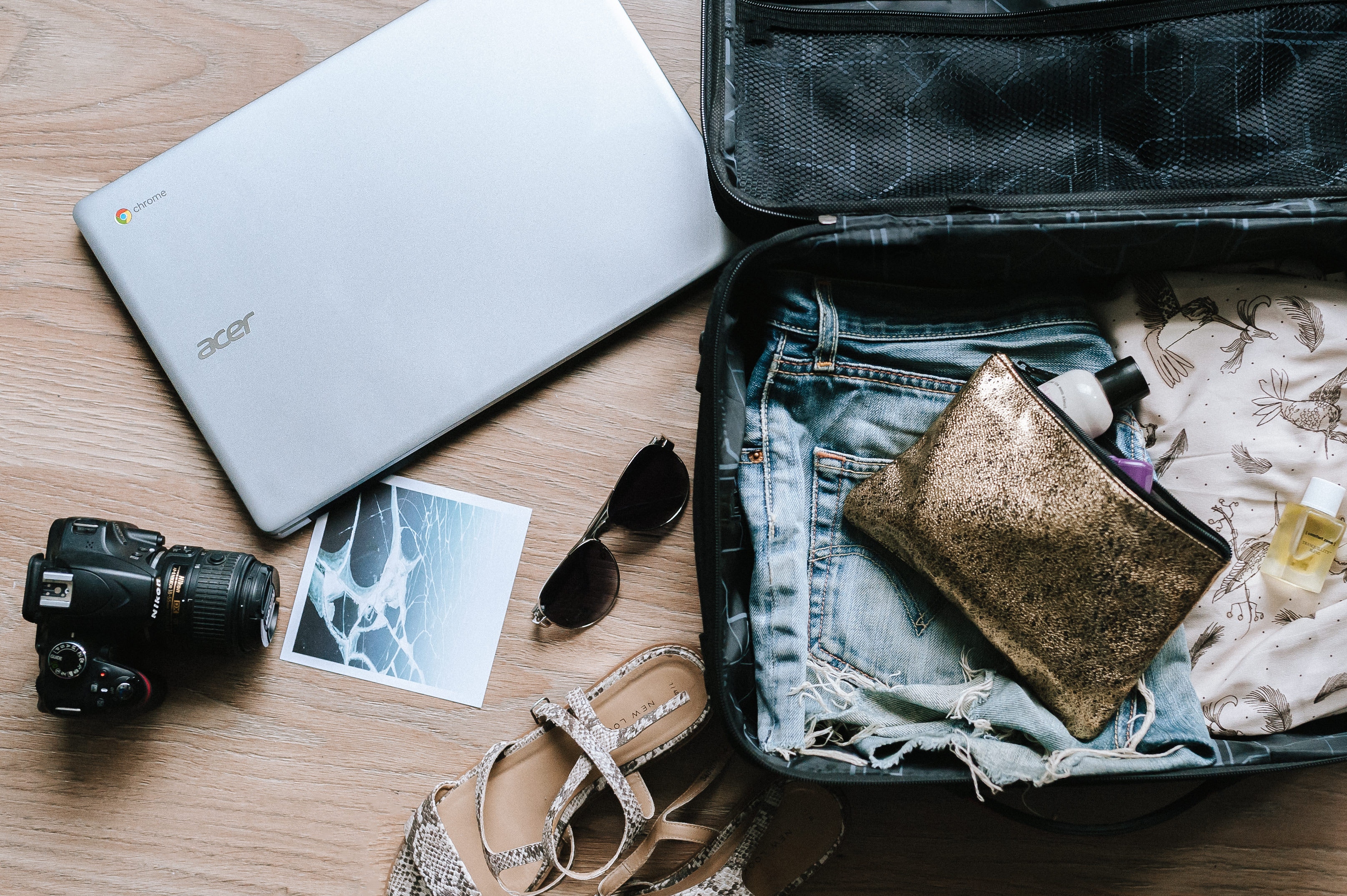 A woman’s suitcase packed for her holiday to Italy