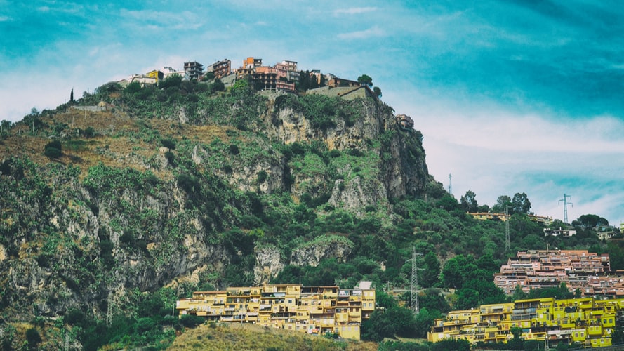 The Sicilian village of Castelmola with colourful buildings on a mountain