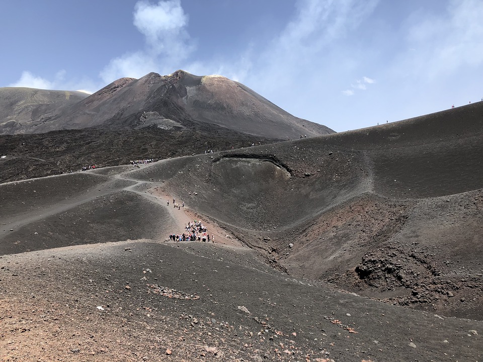 Crowds walking around Mount Etna, Italy