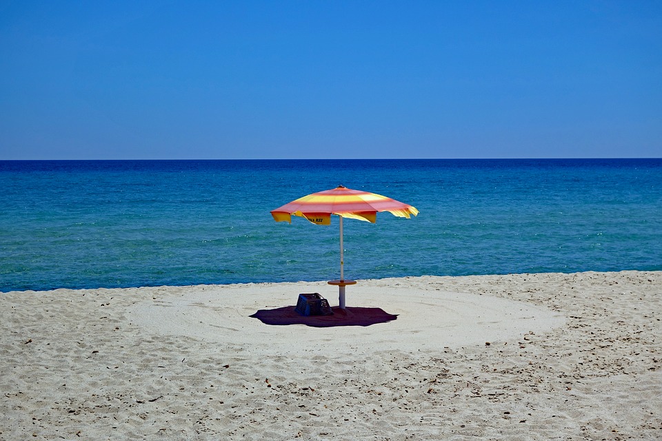 Parasol on the beach in Sardinia 