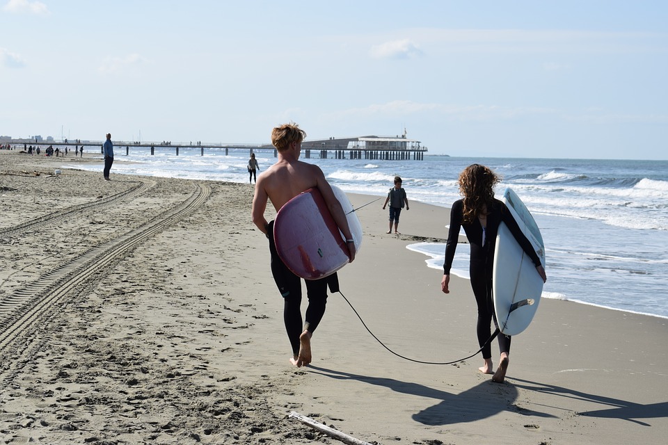 Surfers on a beach near Versilia, Tuscany