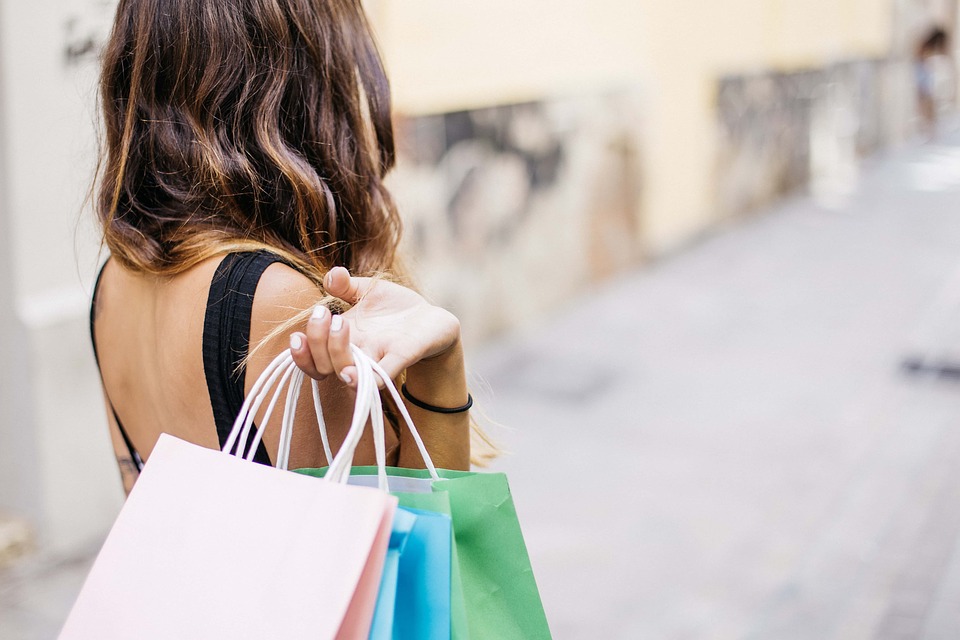 A woman with shopping bags in Olbia