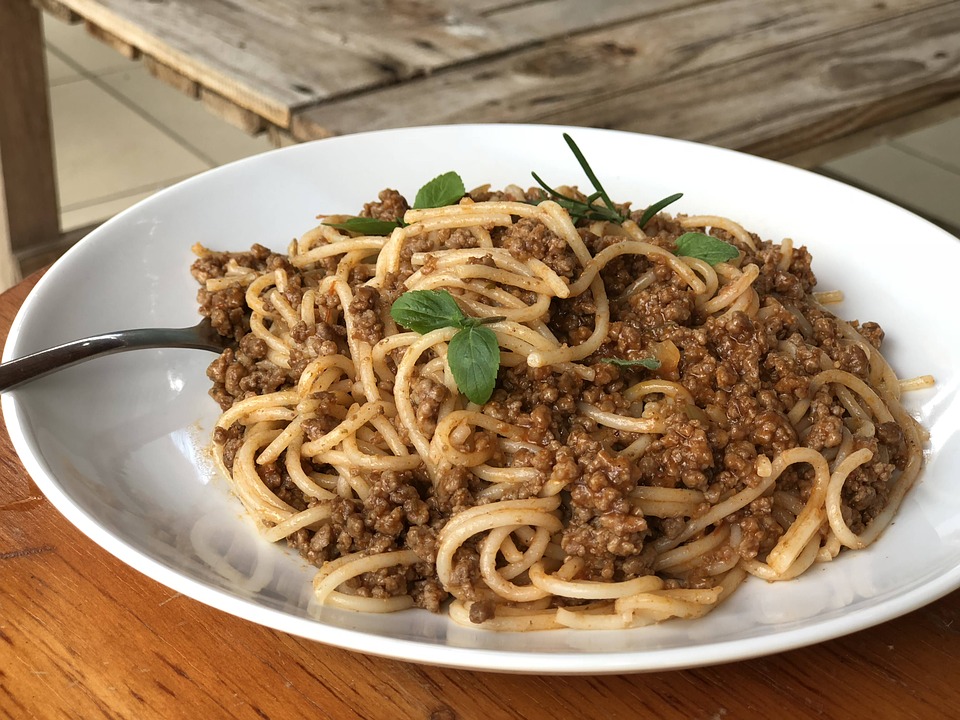 Spaghetti with sauce and meat for dinner in Chieti, Italy