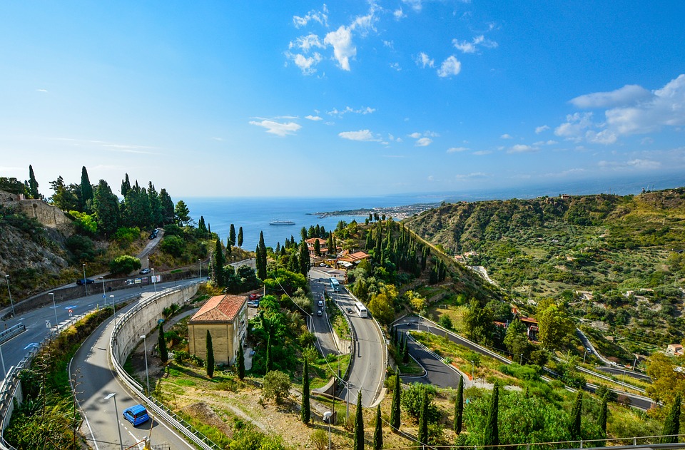 Winding roads on the hillside on a sunny day in Taormina, Sicily